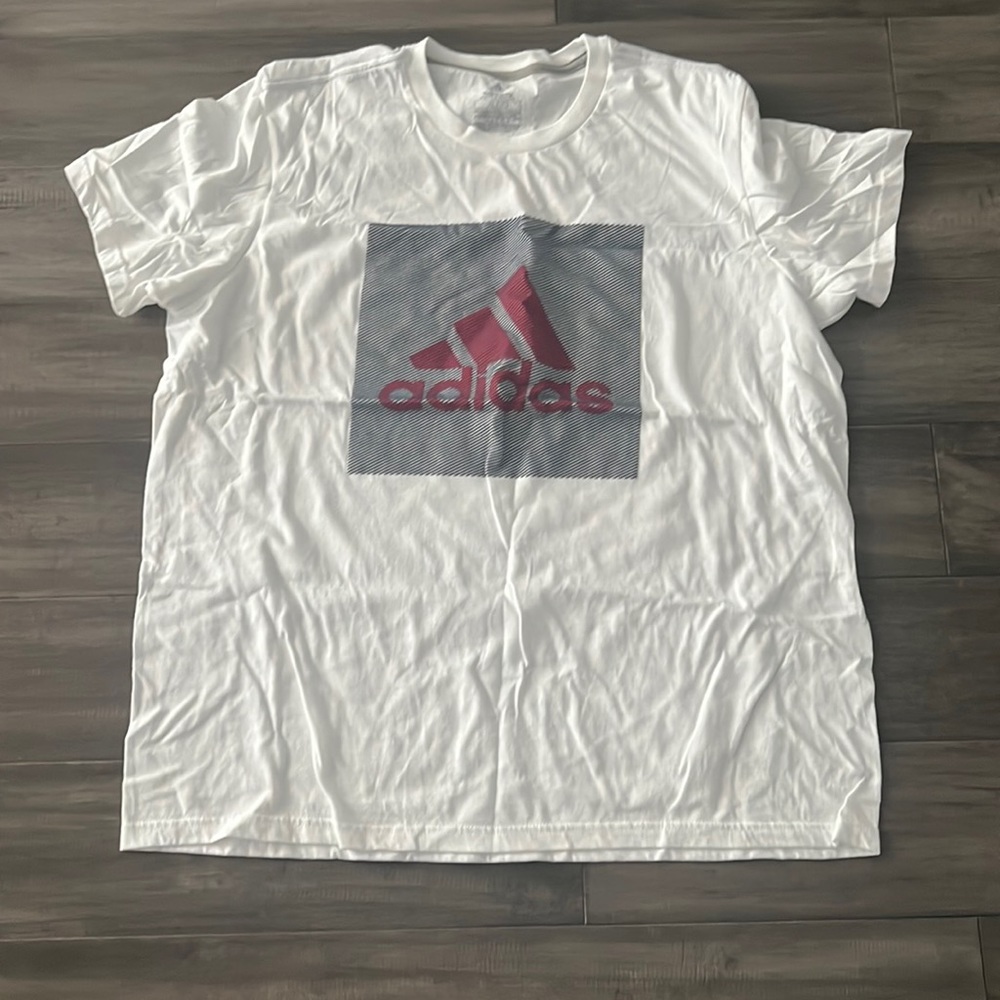 Adidas tee… never worn…$20
